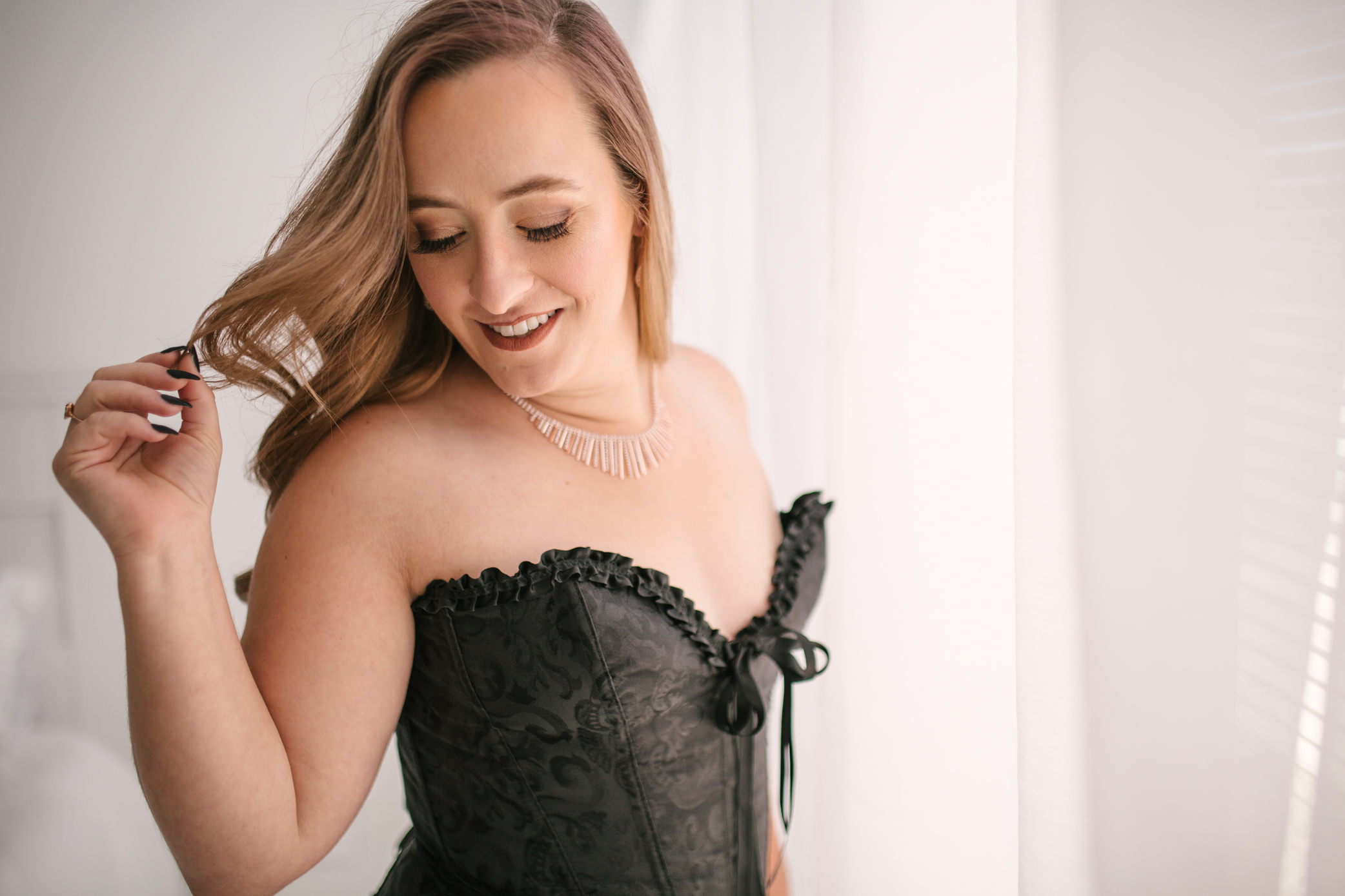 Reasons to book a boudoir session now: build your own self confidence