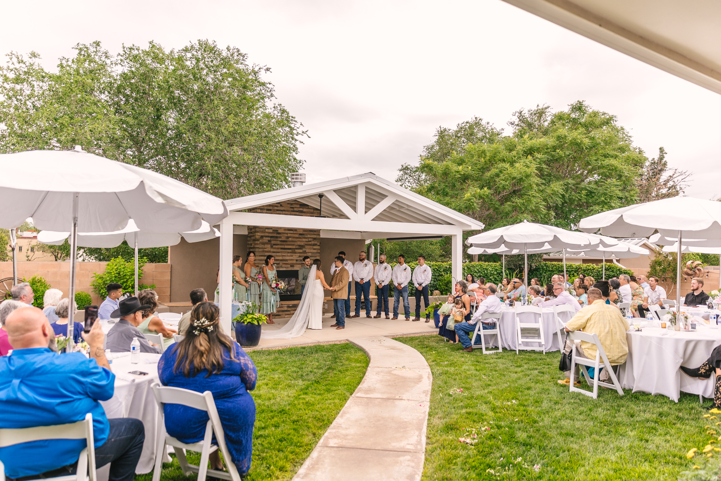backyard wedding ceremony under pergola in Los Ranchos de Albuquerque, New Mexico